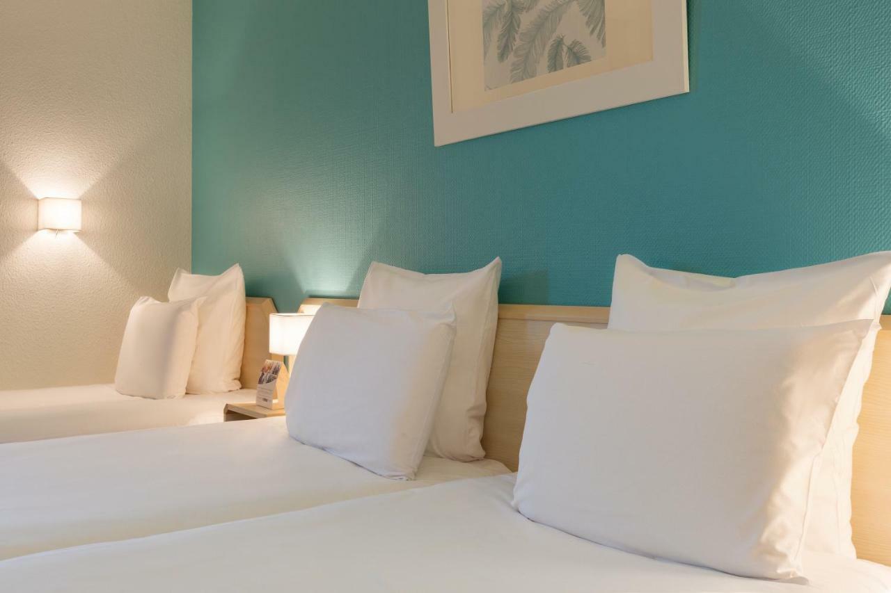 คอมฟอร์ต โฮเต็ล ออร์เลียง ซาร็อง Hotel ซารอง ภายนอก รูปภาพ