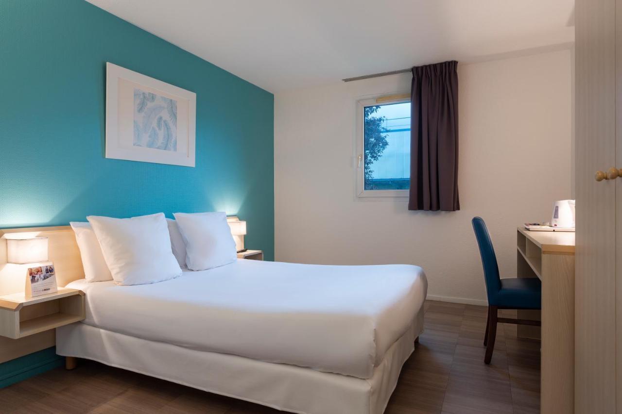 คอมฟอร์ต โฮเต็ล ออร์เลียง ซาร็อง Hotel ซารอง ห้อง รูปภาพ